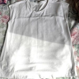 White blouse with a beautiful back design. Size is either a Medium or Large.